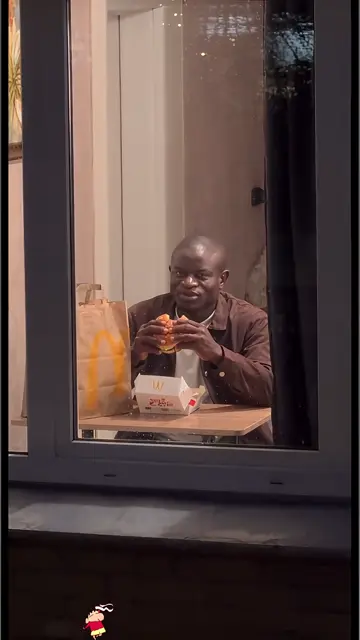 Brown jacket, takeout bag, then the slow pull of the curtain
