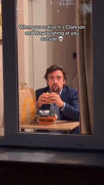 A Richard Hammond face in a suit, with a Top Gear joke on screen