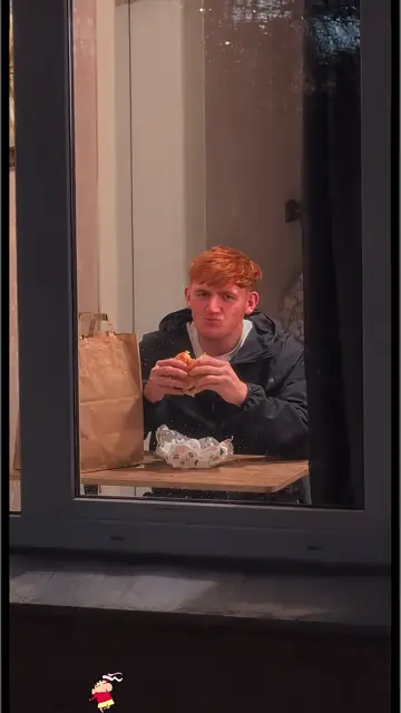 Same template, new sitter: red hair, dark jacket, the stare